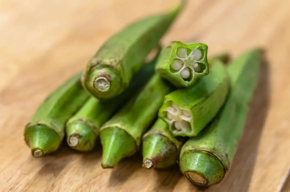 Fresh okra sitting on table