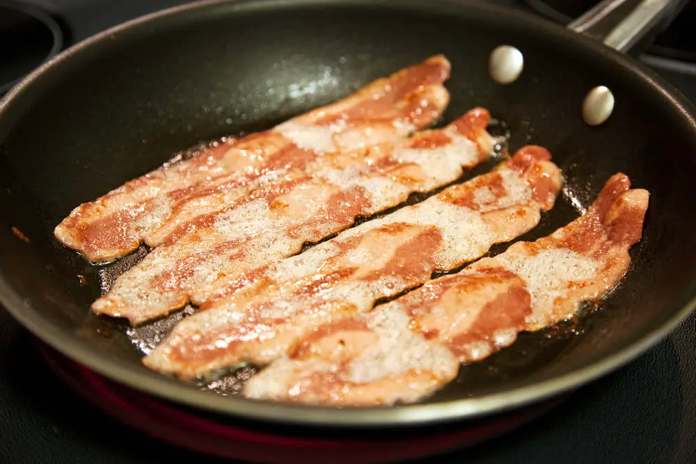 Turkey bacon cooking