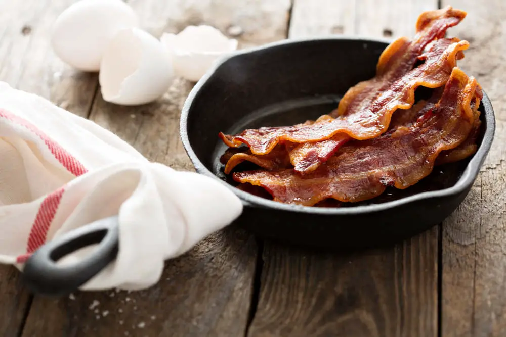 Bacon frying in a pan