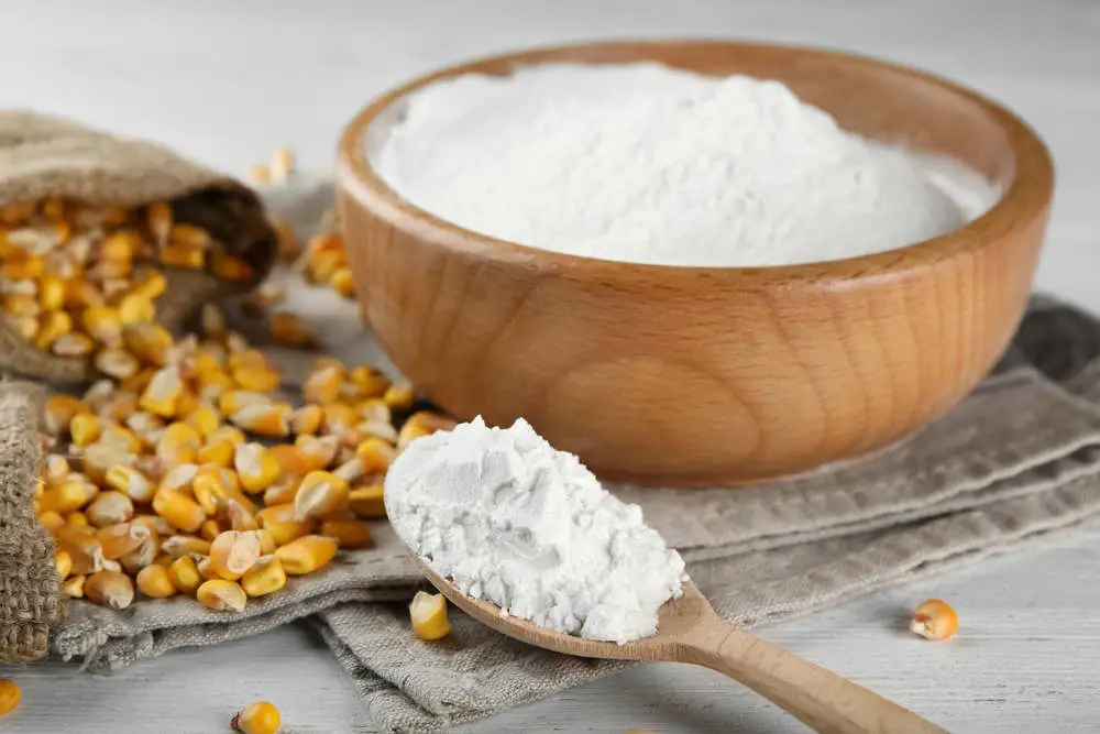 Cornstarch in bowl and spoon