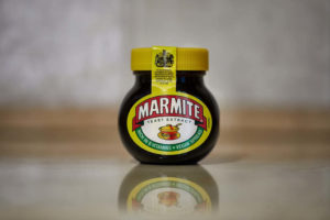 Marmite jar on table
