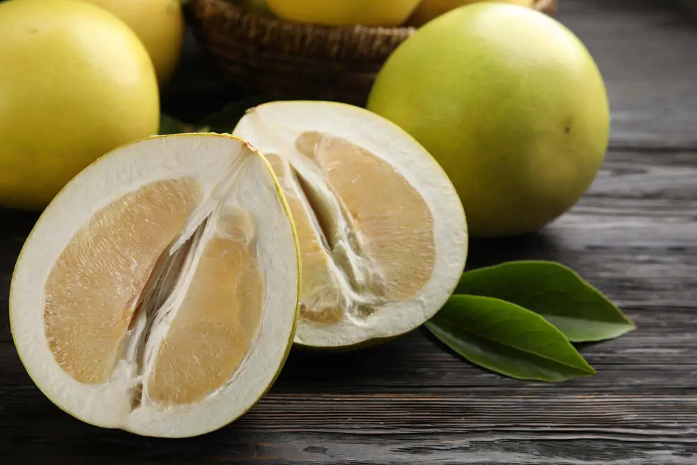 Pomelo fruit on table