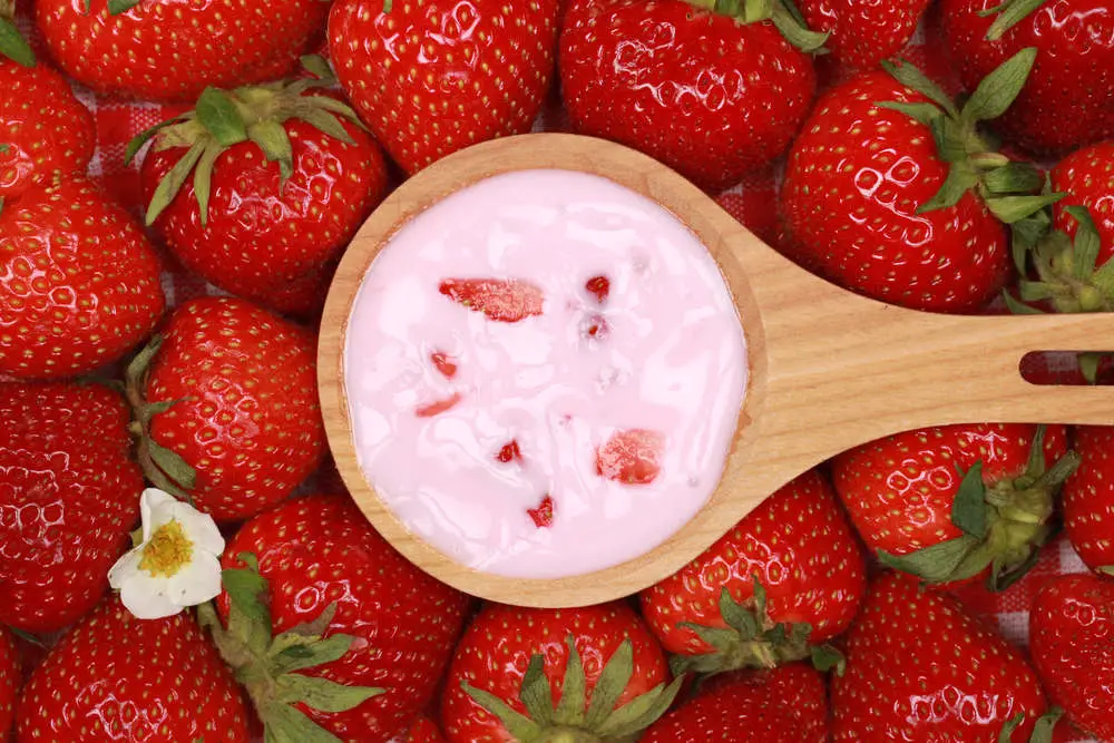 Strawberry yogurt in a spoon